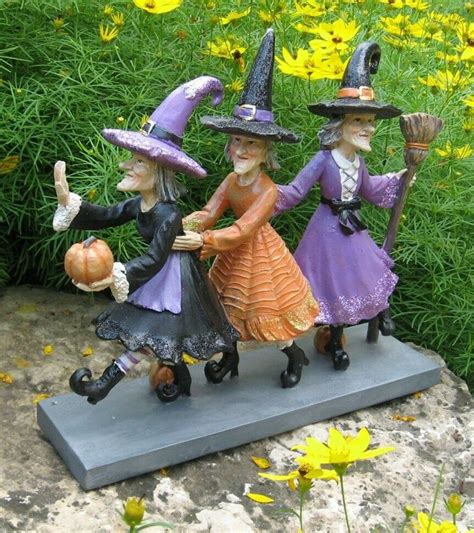 Make Your Halloween Decor Truly Spellbinding with a Witch Figurine and Stakes